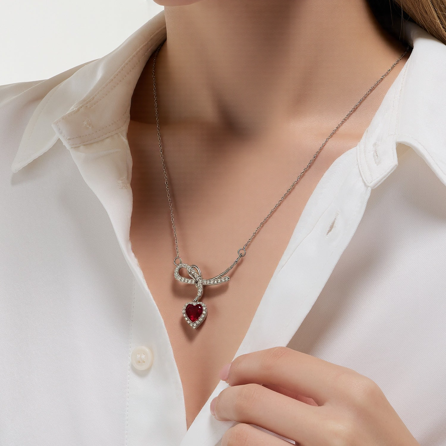 Silver Bow Necklace with Red Heart Pendant
